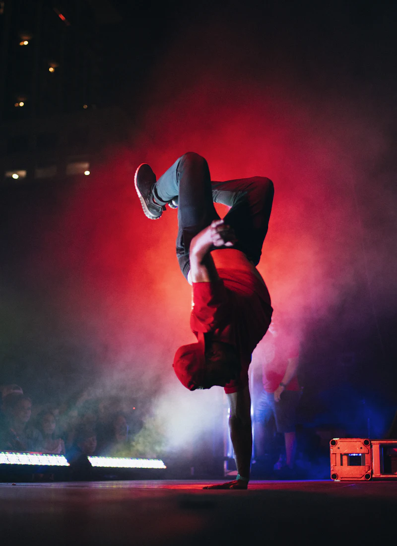 A dancer mid-move in dramatic light